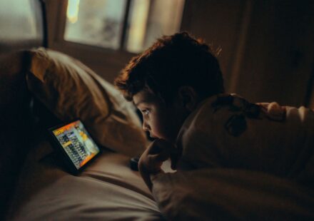 child watching tablet screen