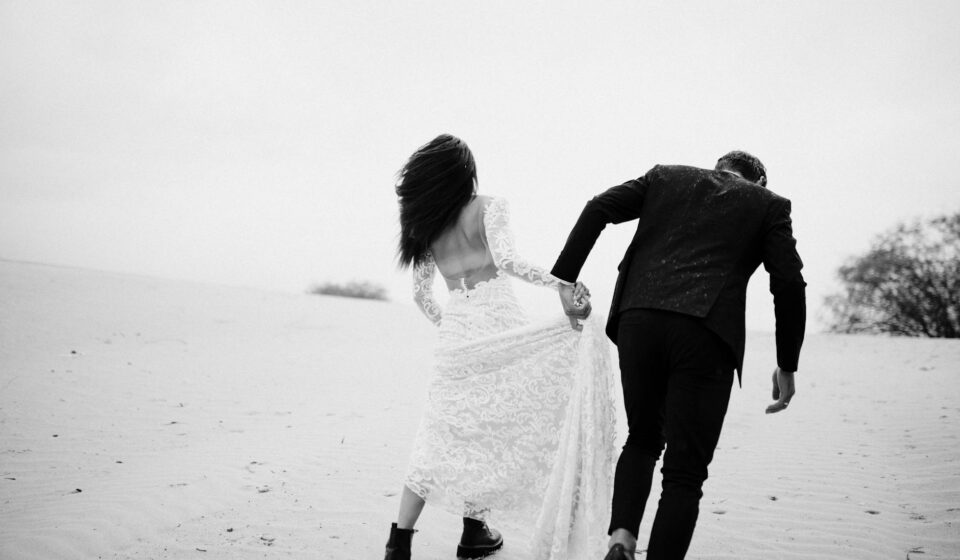 couple eloping beach