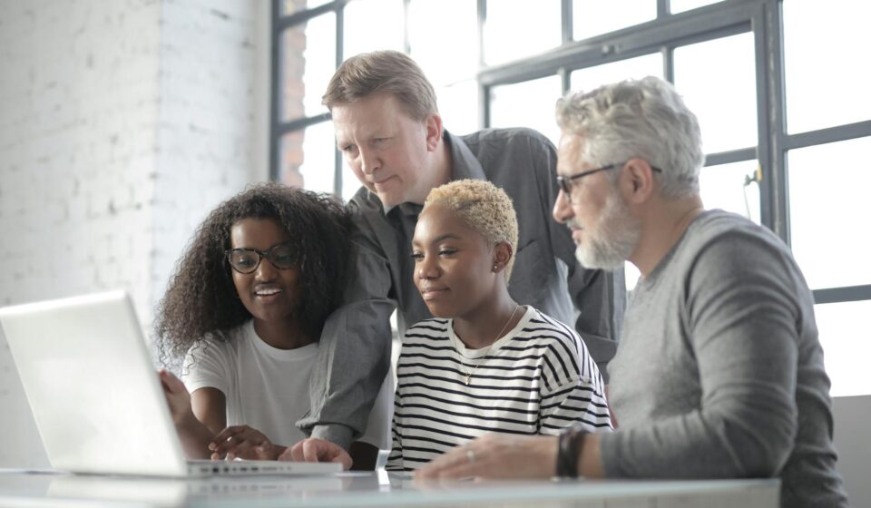 diverse professionals collaborating online