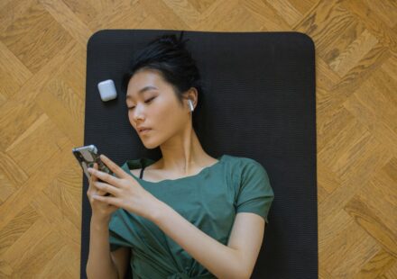 person using airpods for translation