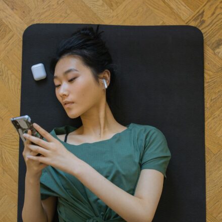 person using airpods for translation