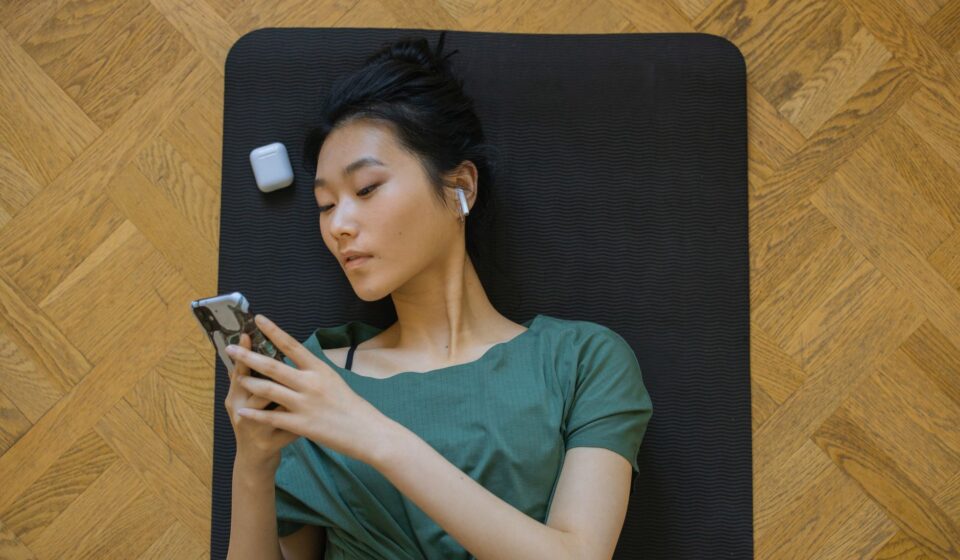 person using airpods for translation